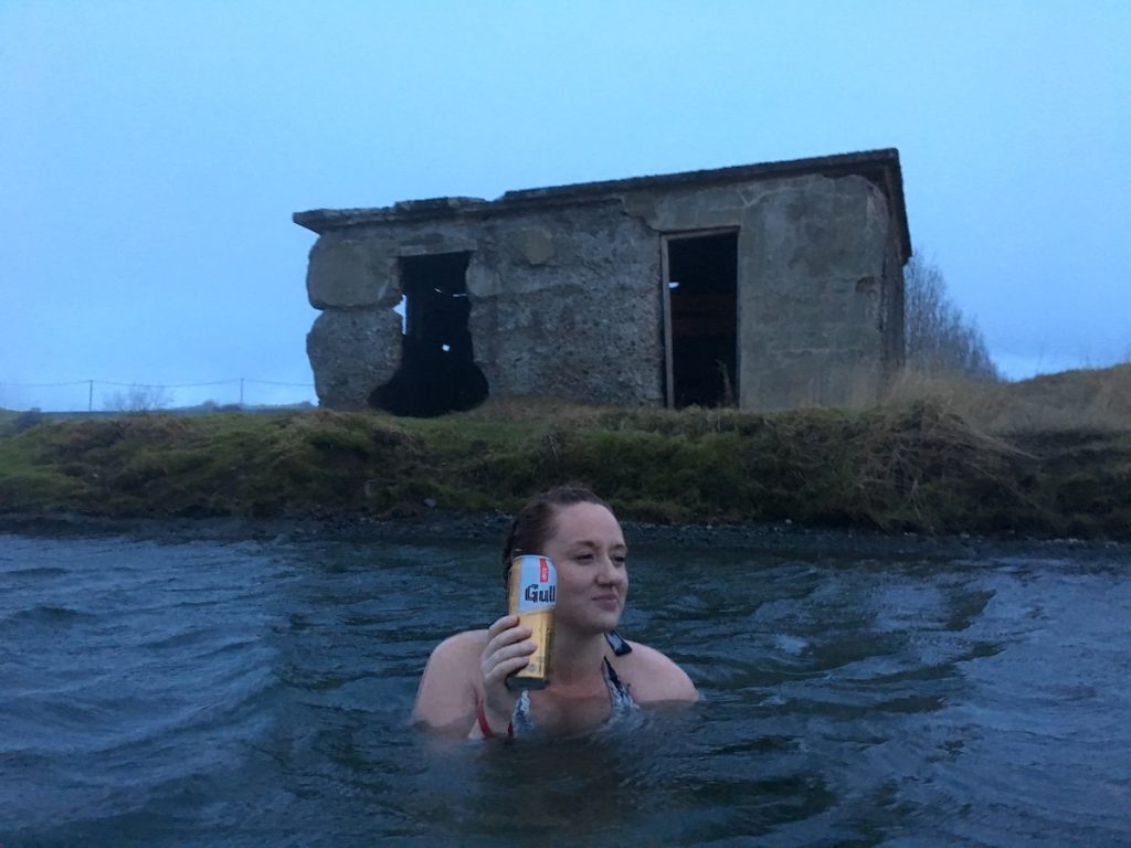 Sooz drinking a beer in Iceland Secret Lagoon