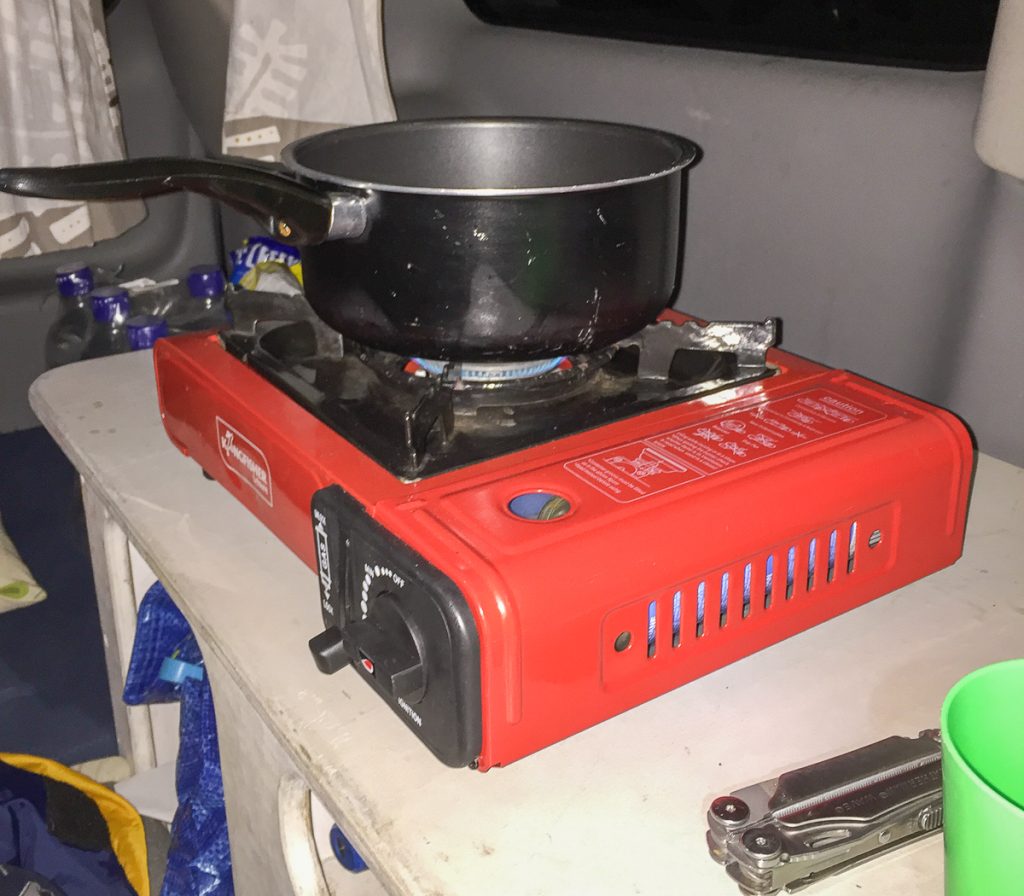 Campervan cooking on. hot pot