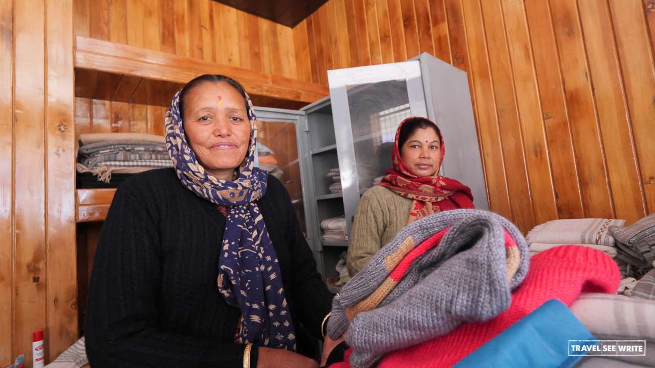 local women selling goods at a market