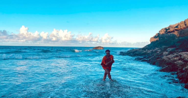 Meredith San Diego in the ocean breaking the Black and Outdoors stereotype