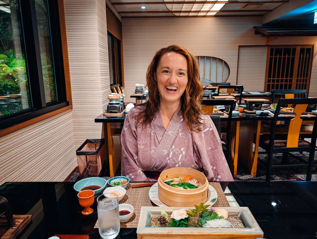 woman eats vegan meal at a Ryokan in Japan