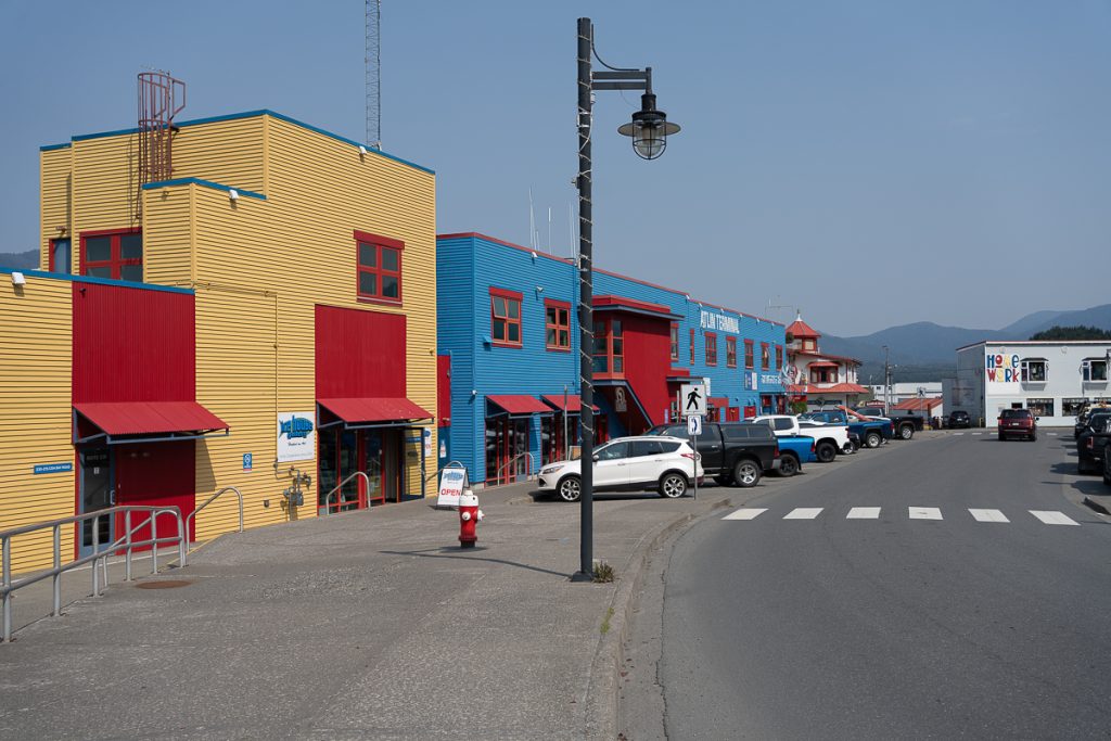 Brightly painted buildings on a street in downtown Prince Rupert, BC.
