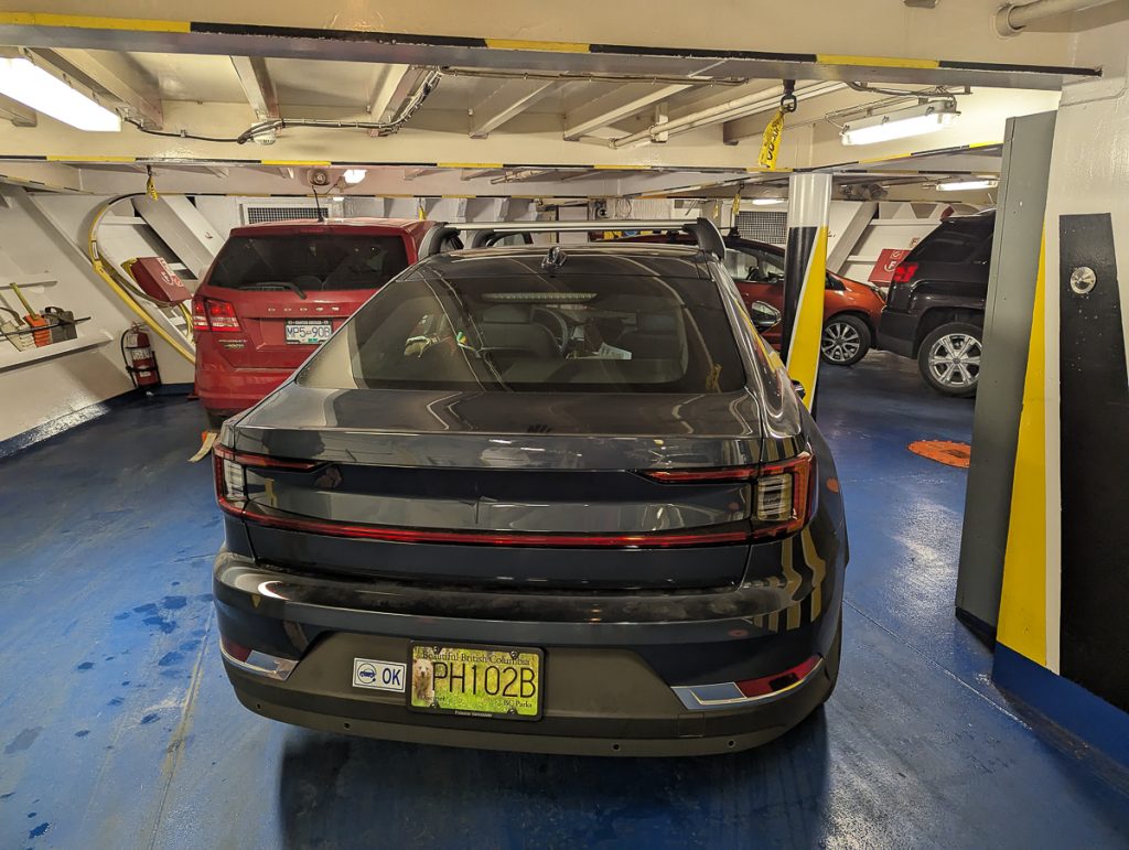 Cars parked inside a ferry. 