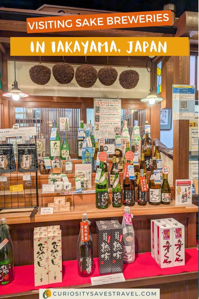 Shelves packed with bottles of sake inside a brewery with the text "Visiting sake breweries in Takayama, Japan."