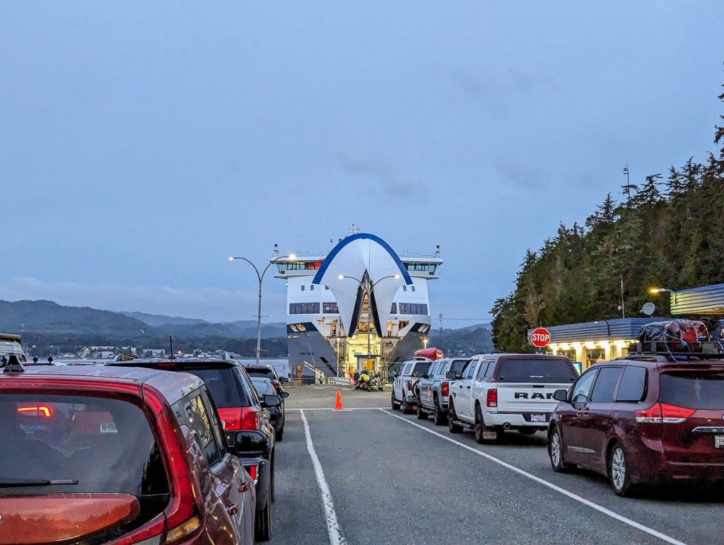 A line of cars waiting to board a ferry