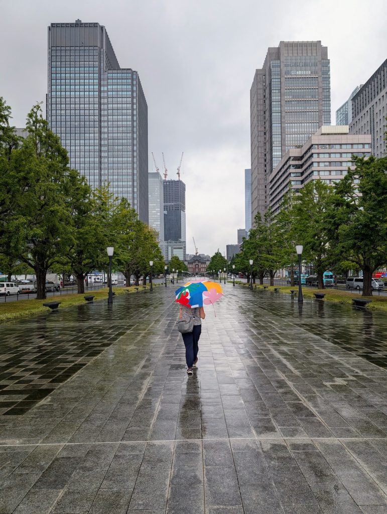 A woman with a colorful umbrella in Tokyo