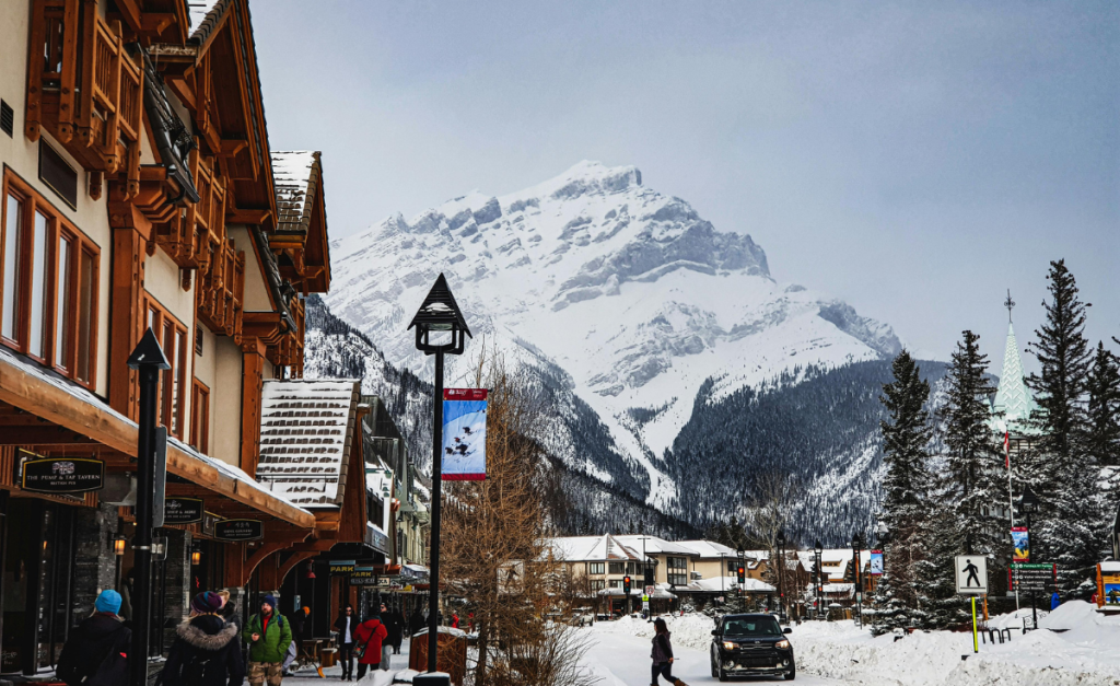 Banff downtown in winter with a snow-covered mountain