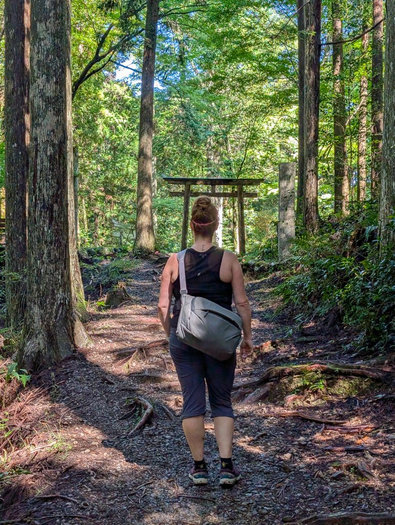 Susanna walks up to a shrine