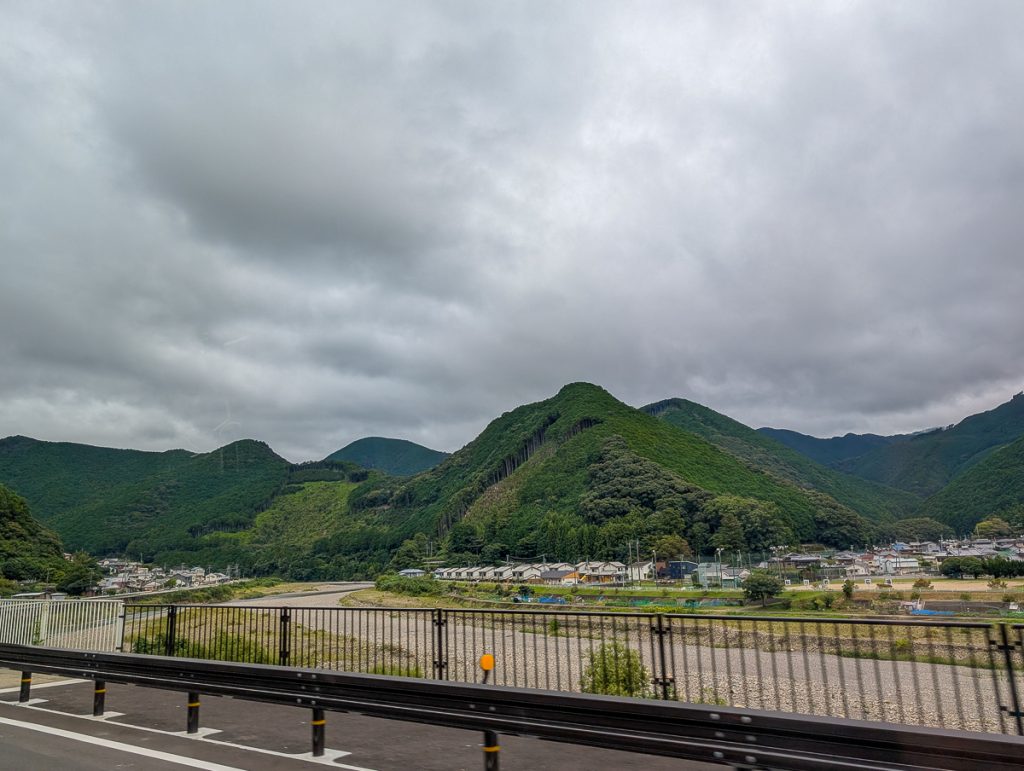 Riding the bus on the Kumano Kodo, views of mountains and a river