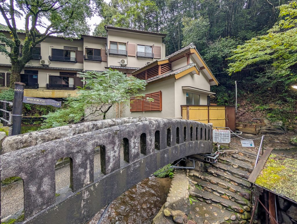 THe Onsen town of Yunomine with old houses and a stone bridge