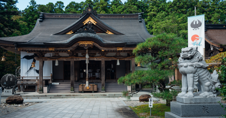 Hiking the Kumano Kodo in Japan. The entrance to Hongu shrine with a statue