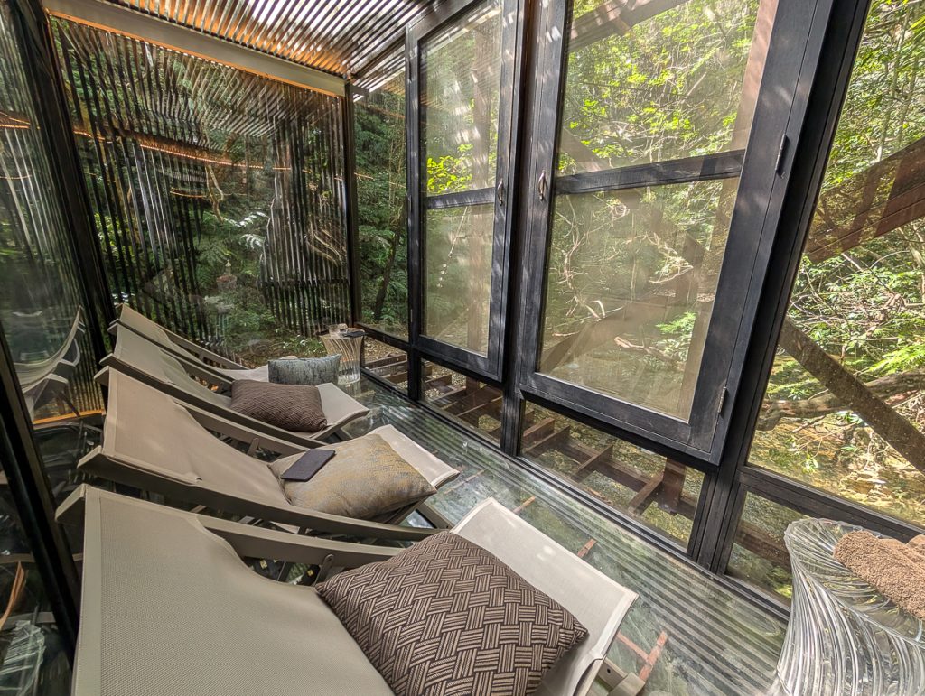 A glass sauna and relaxation room