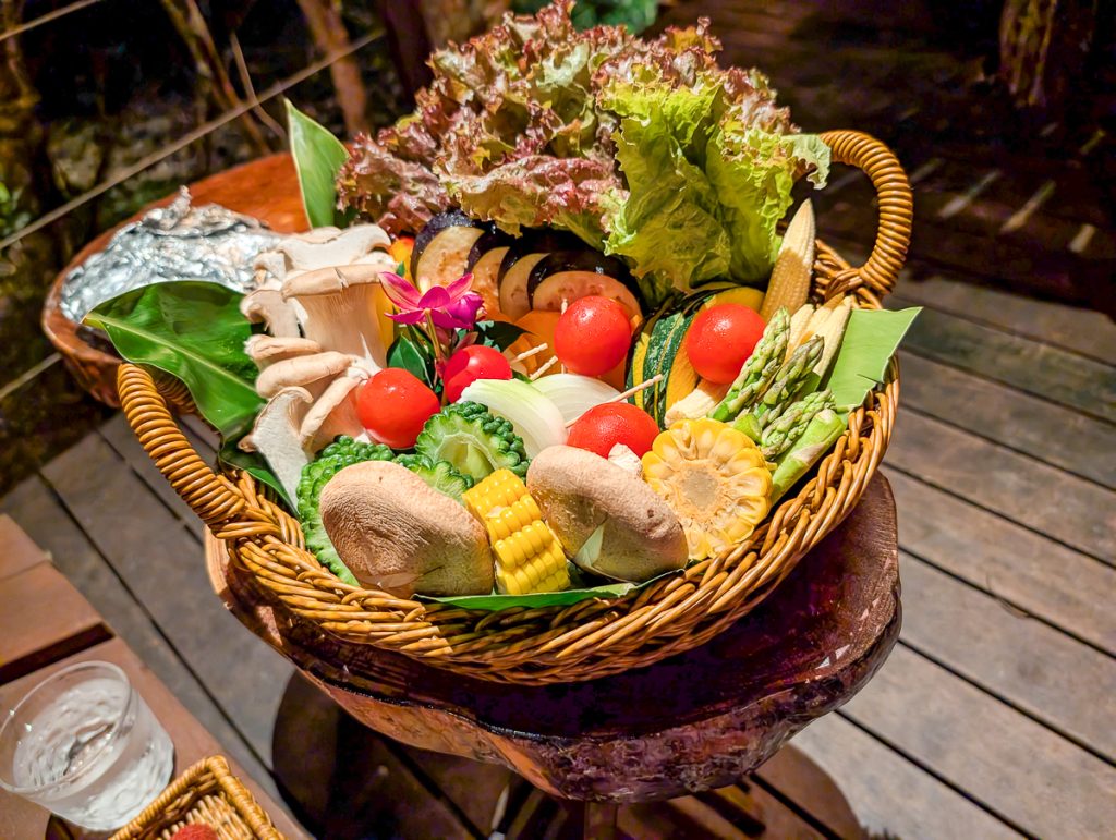 a steamer basket full of vegetables
