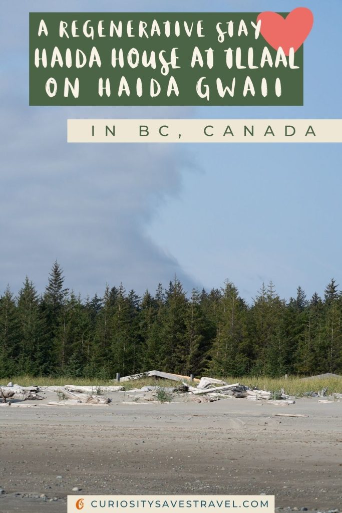 A photo of sand from a beach with pine trees and the roof of a small building just peeking over the dunes with a text box in the sky that reads "A regenerative stay Haida House at Tllaal on Haida Gwaii in BC, Canada."