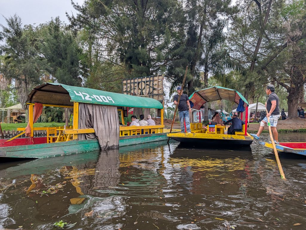 Traditional flat-bottomed boats on a canal in Mexico.