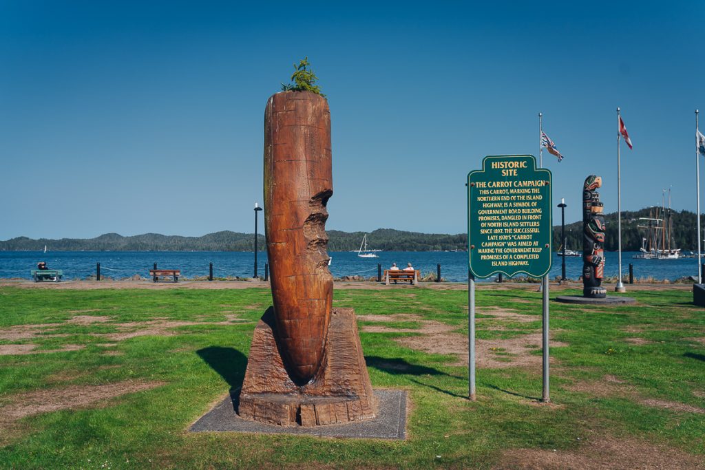 A large wooden statue of a carrot in Carrot Park Port Hardy