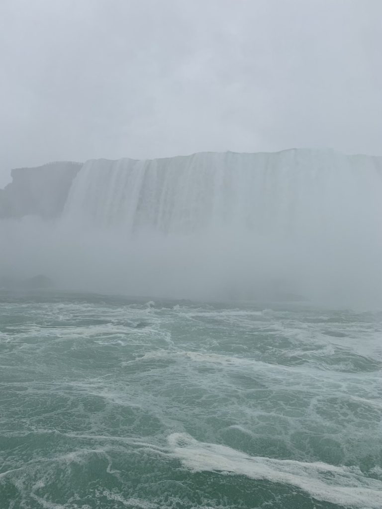 A very misty view of the foam at the base of Niagara Falls taken from a boat.