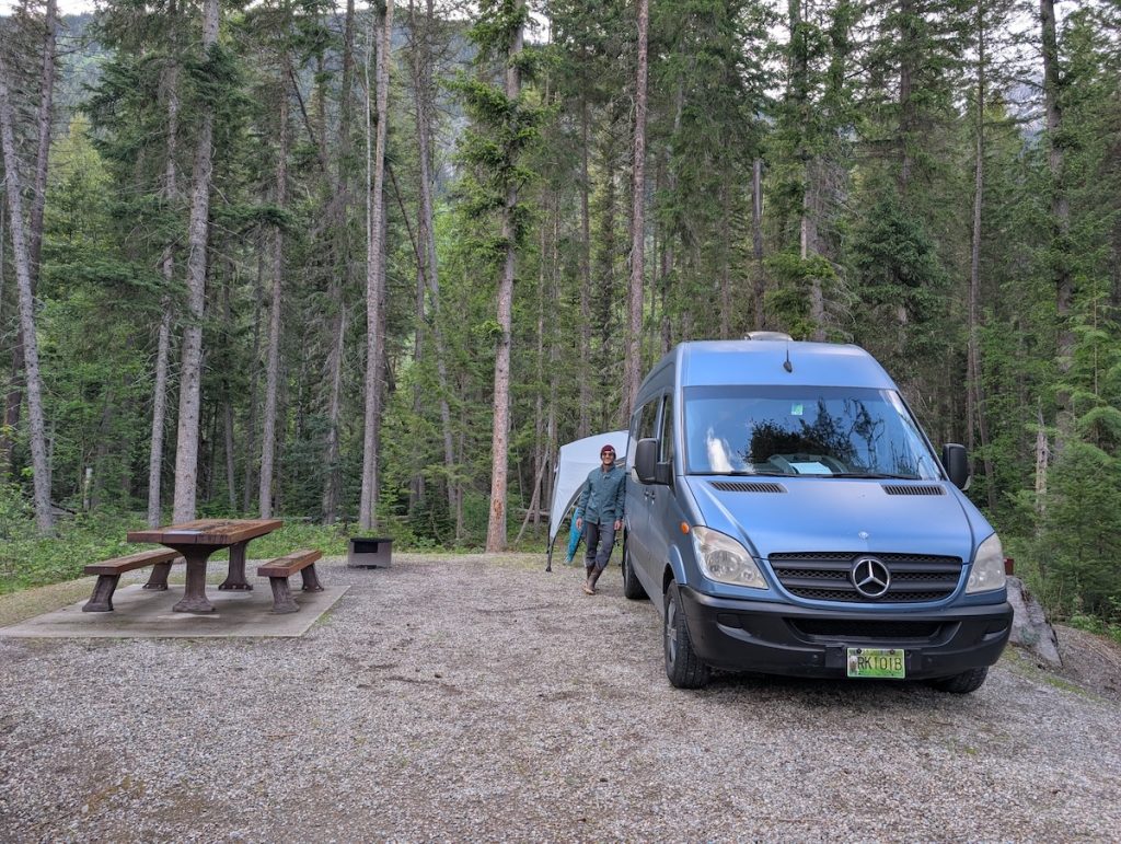 A blue campervan at Robson River campground
